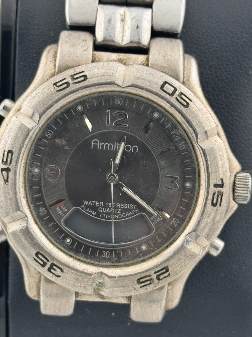 Armitron Men's Ana-Digi Alarm Chronograph Sport Watch Black Dial Rotating Bezel